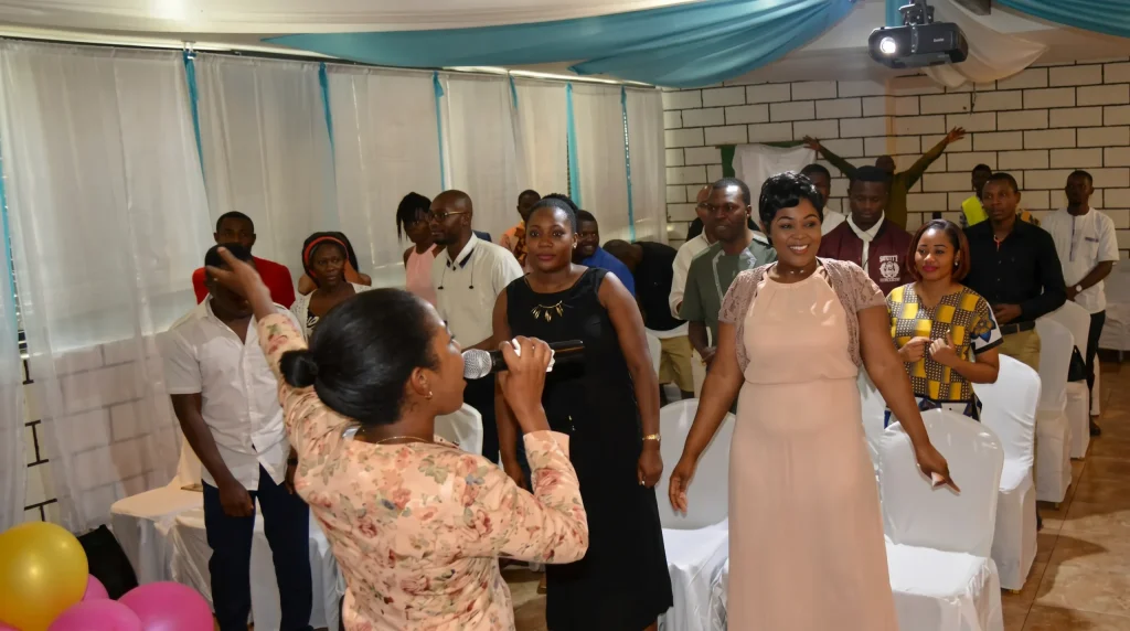 The congregation worshipping and celebrating together