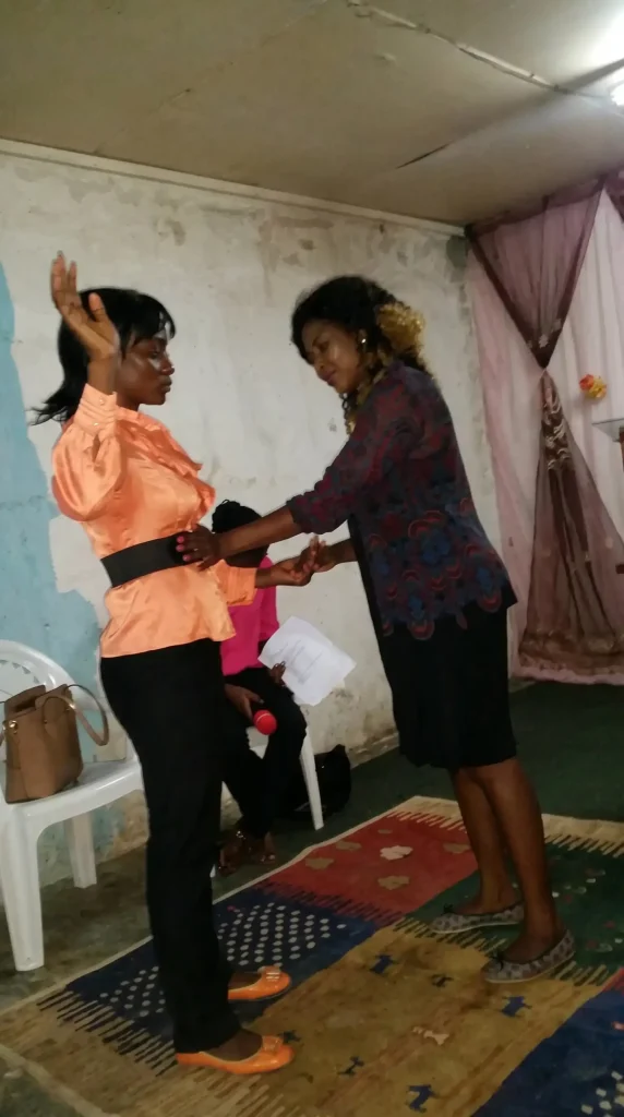 Vanessa Musenja preaching to the congregation