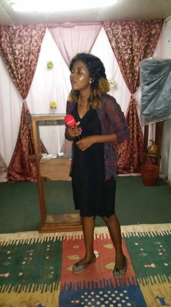 Vanessa Musenja teaching with the microphone