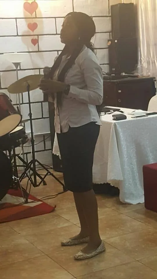 Vanessa Musenja ministering at the podium